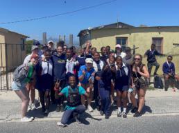 A group photo of tourists and locals in Khayelitsha